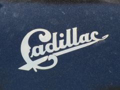 Logo: Replica of 1902 Cadillac